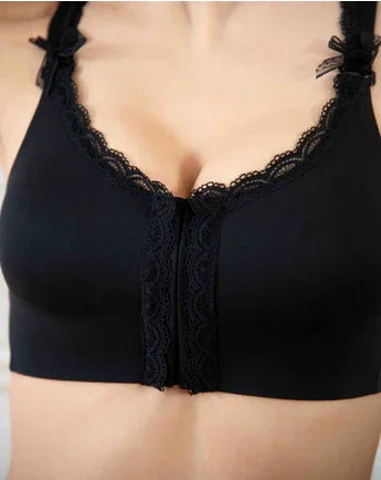 Black post-surgery lace trim bra with front closure, worn by model, Paris Embody Stage 1